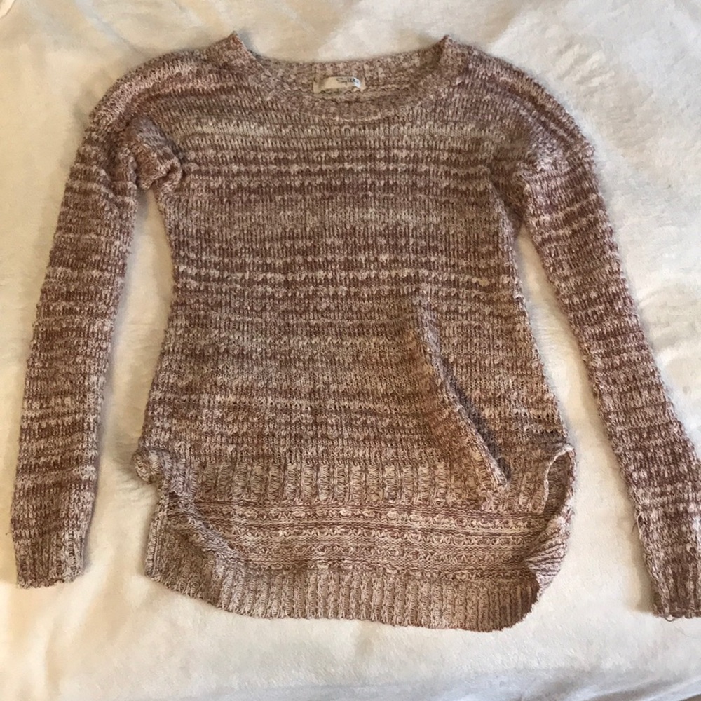 white and pink sweater